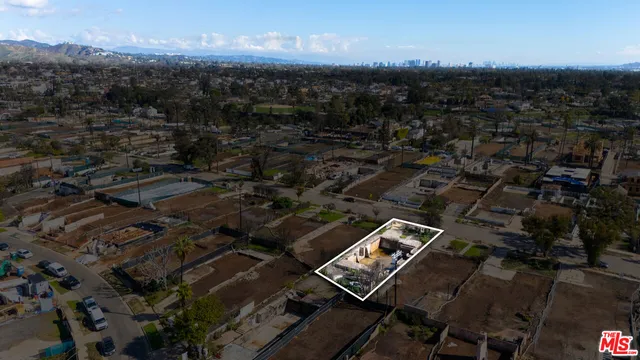 a view of swimming pool with a outdoor seating