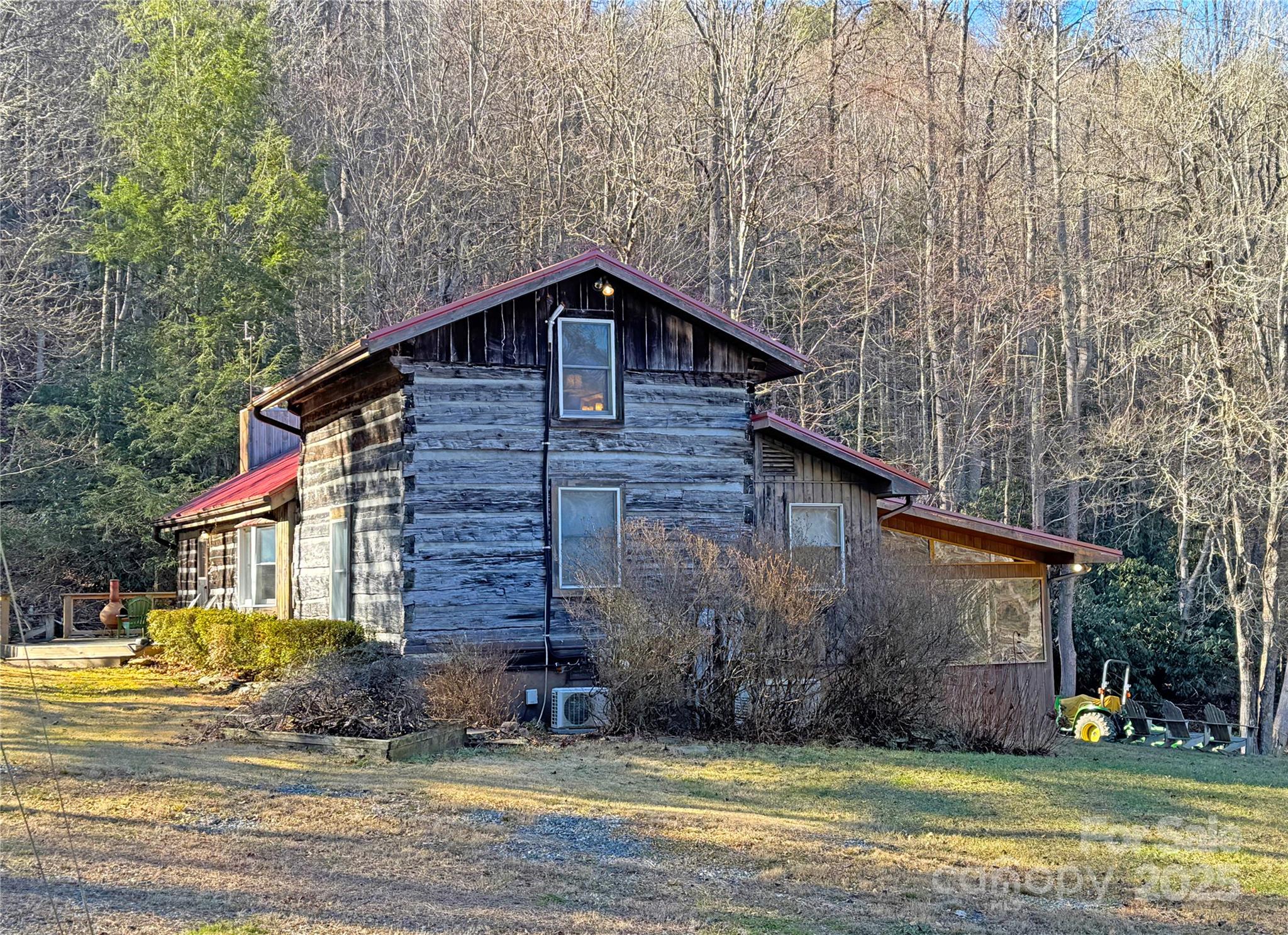 3076 Anderson Cove Road Hot Springs, NC 28743 - Photo 38 of 44 a view of a house with a yard