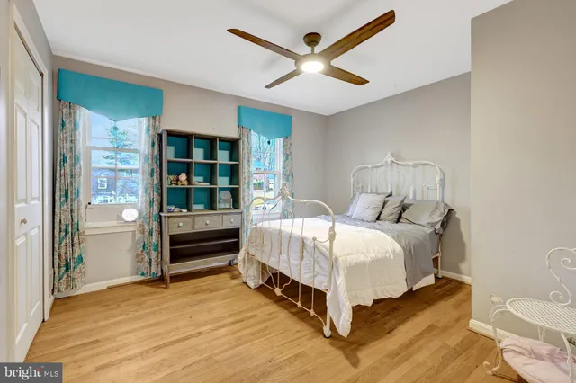 a bedroom with a bed and a cabinets
