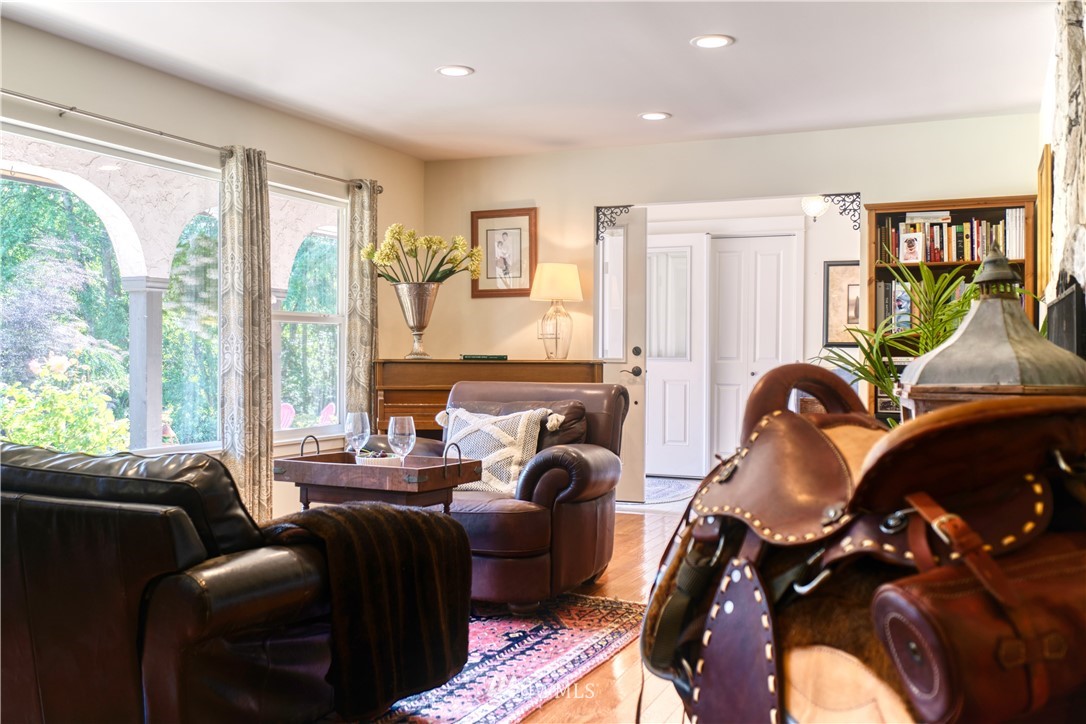 1890 Benson Road Point Roberts, WA 98281 - Photo 7 of 35 a living room with furniture and floor to ceiling windows