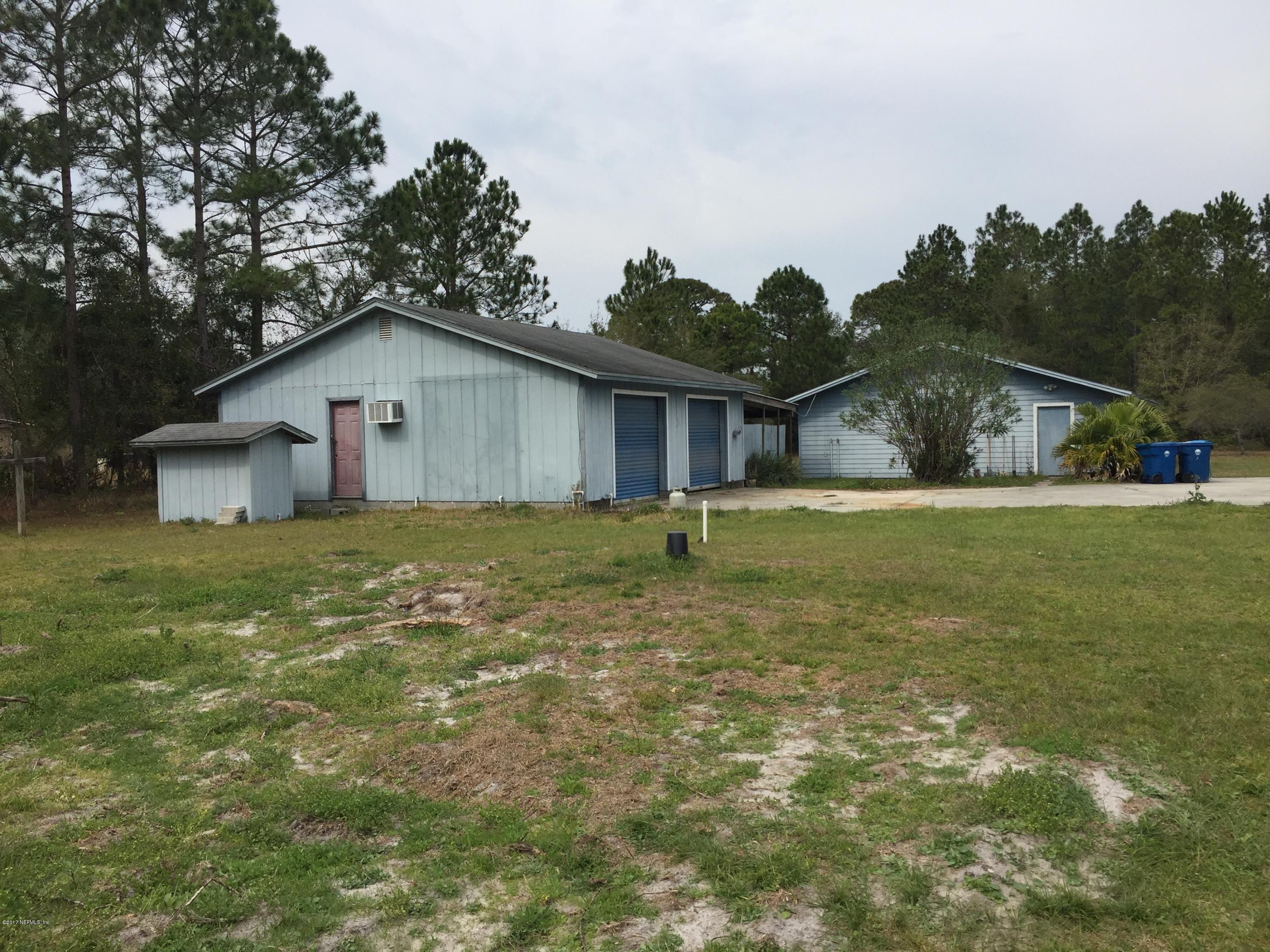 10400 Sawpit Road Jacksonville, FL 32226 - Photo 13 of 30 a view of a house with a yard