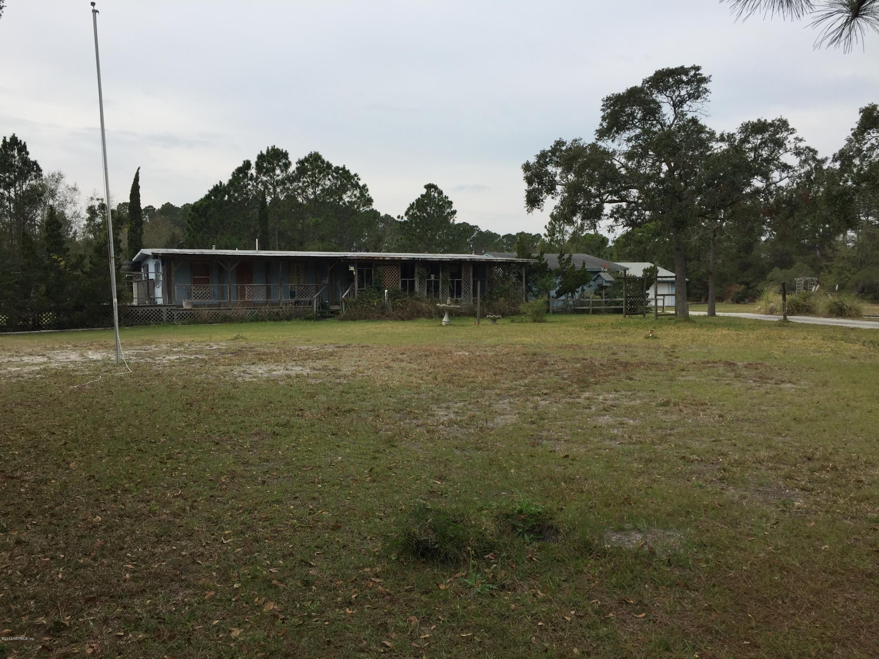 10400 Sawpit Road Jacksonville, FL 32226 - Photo 22 of 30 a backyard of a house