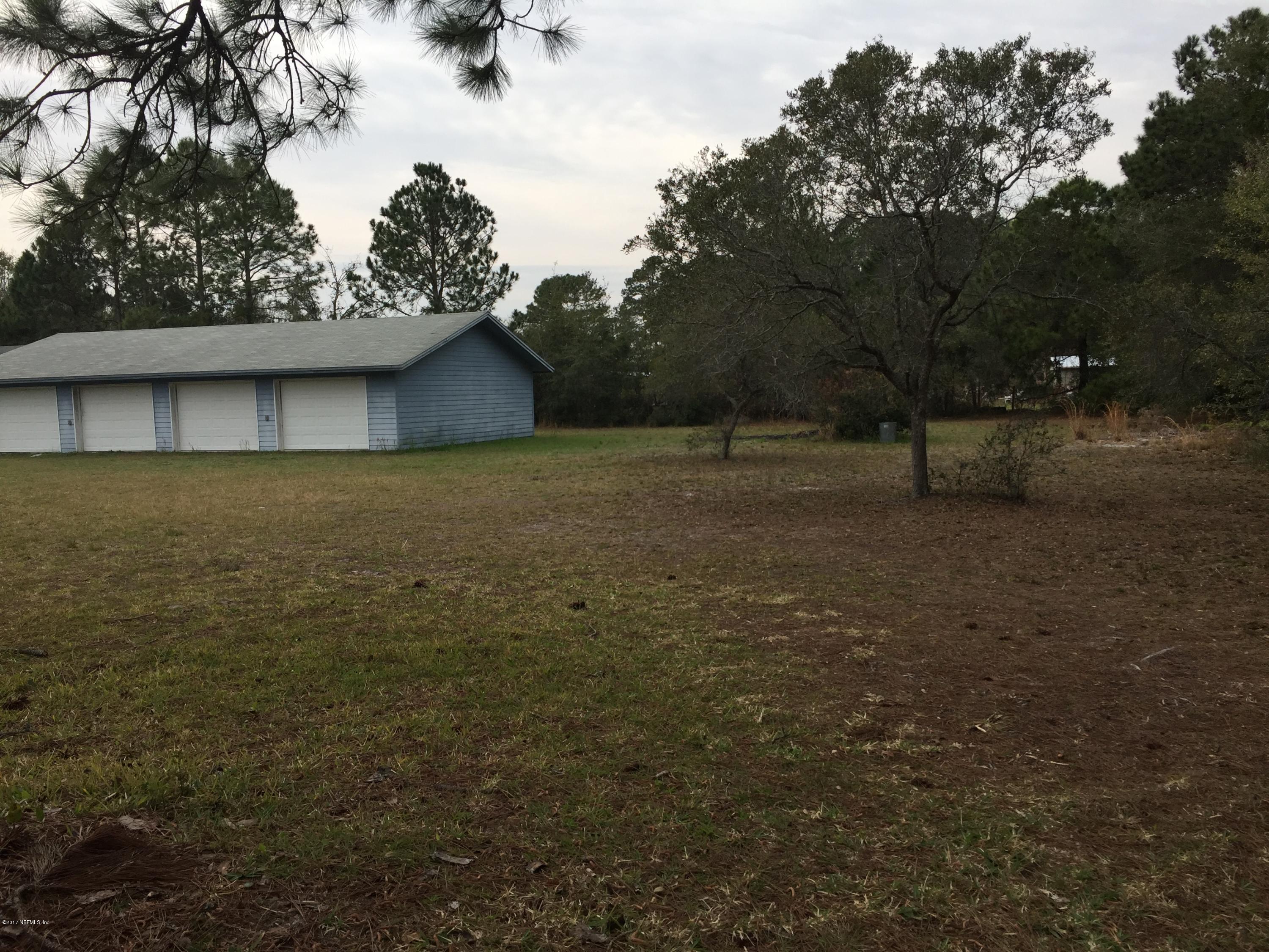 10400 Sawpit Road Jacksonville, FL 32226 - Photo 27 of 30 a view of a house with a yard