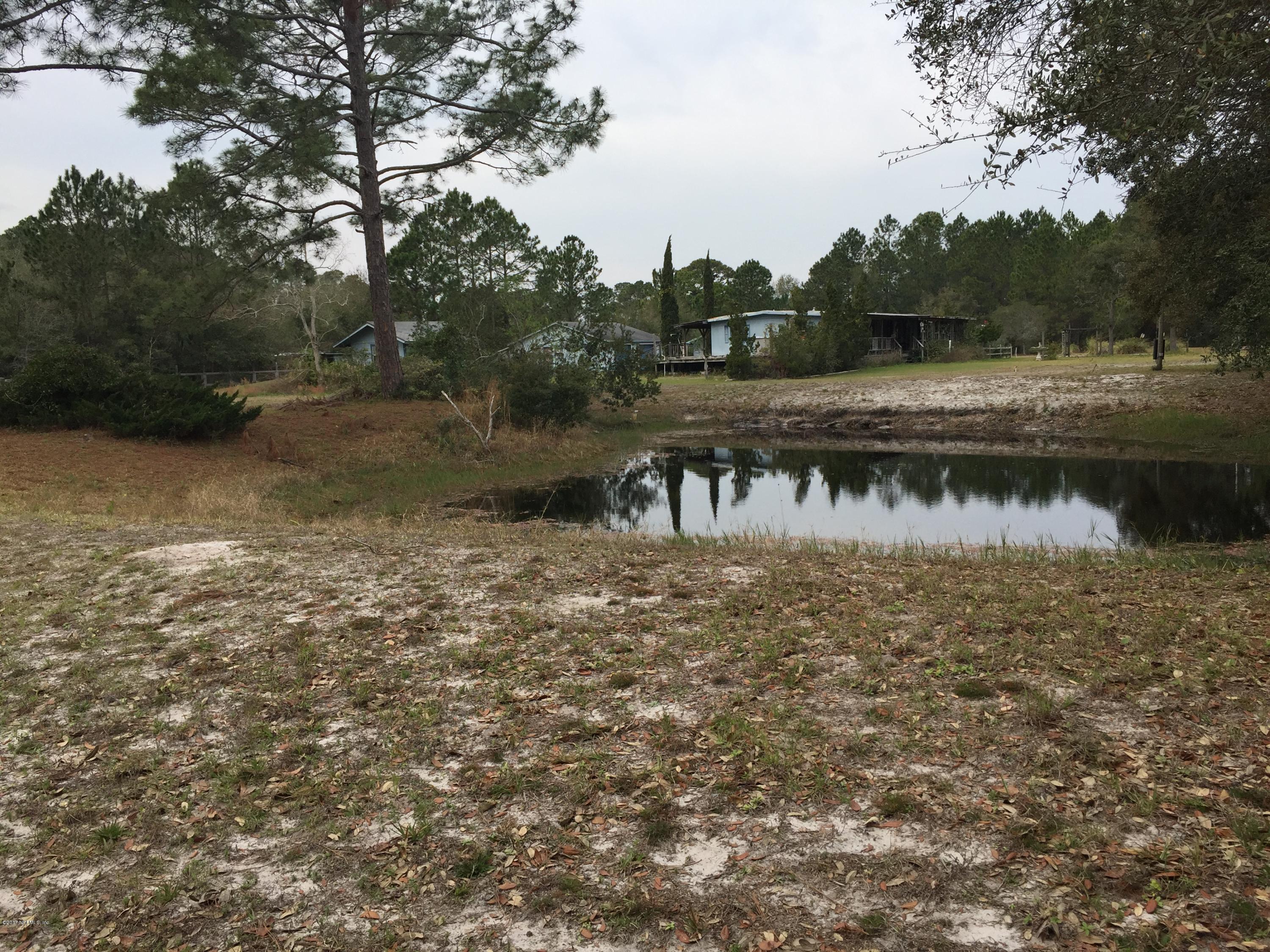 10400 Sawpit Road Jacksonville, FL 32226 - Photo 3 of 30 a view of lake with green space