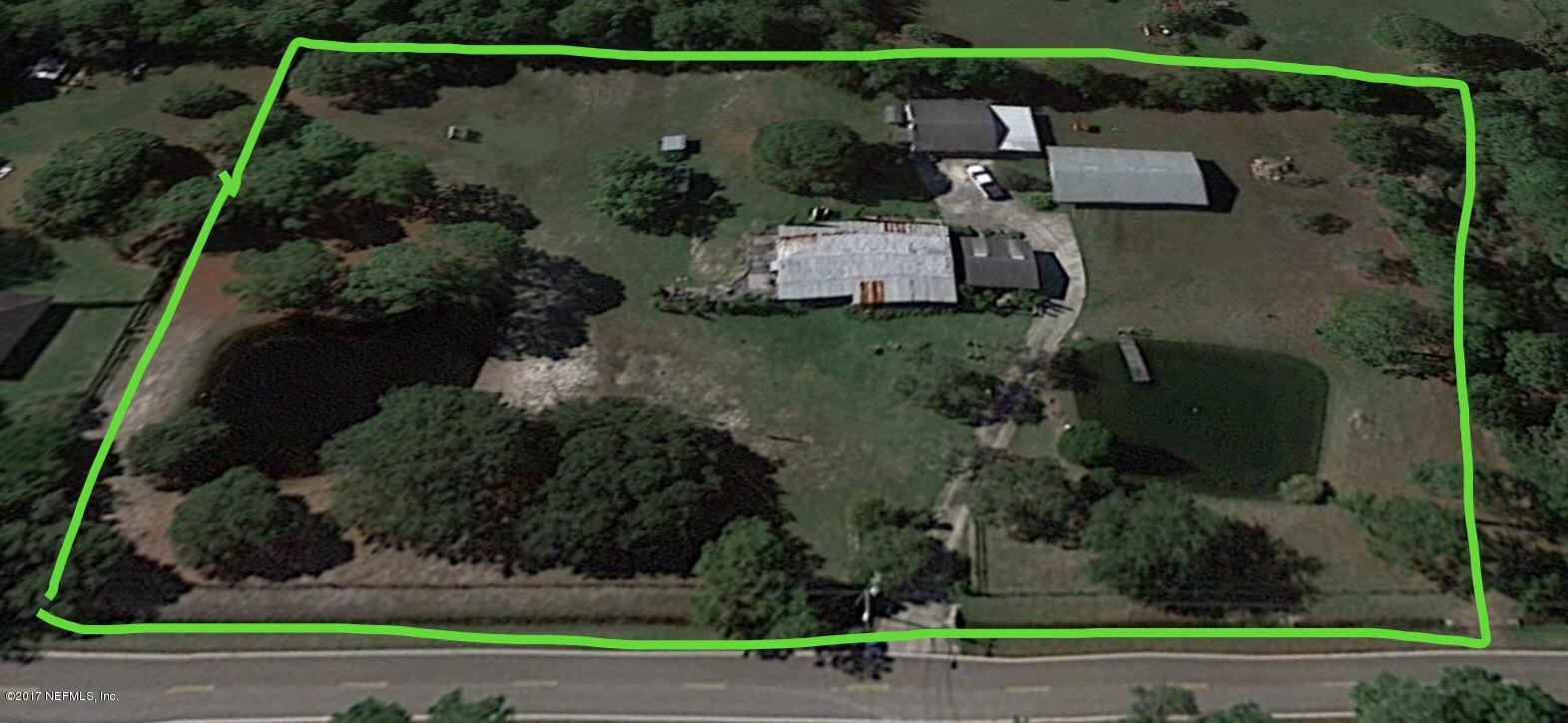 10400 Sawpit Road Jacksonville, FL 32226 - Photo 8 of 30 an aerial view of a house with a yard and potted plants