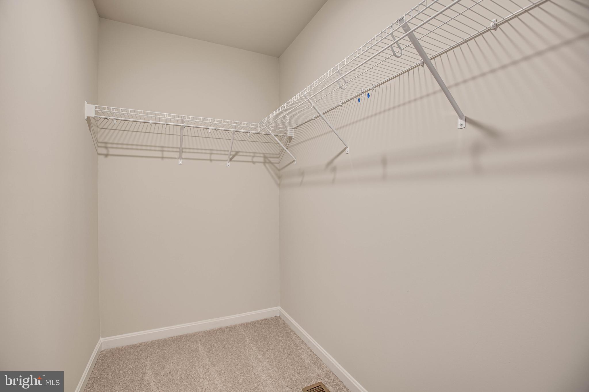 2 Ferry Landing Colonial Beach, VA 22443 - Photo 14 of 62 a view of a room with racks on the wall