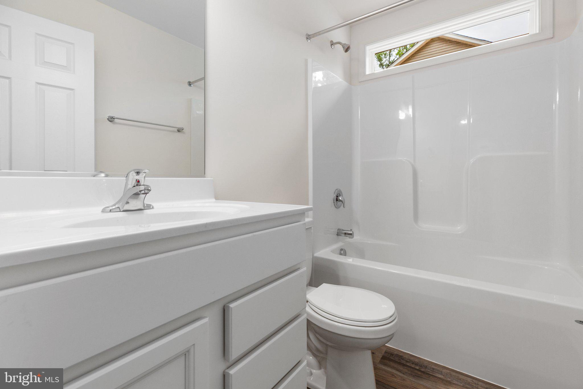 2 Ferry Landing Colonial Beach, VA 22443 - Photo 27 of 62 a bathroom with a sink toilet and shower