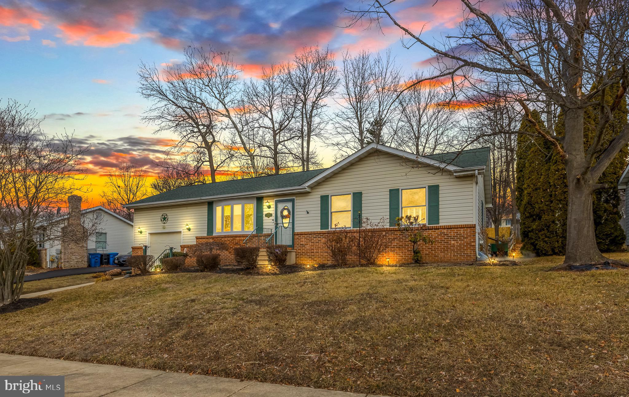 303 Gray Mt Circle Elkton, MD 21921 - Photo 1 of 35 a front view of a house with a yard and trees