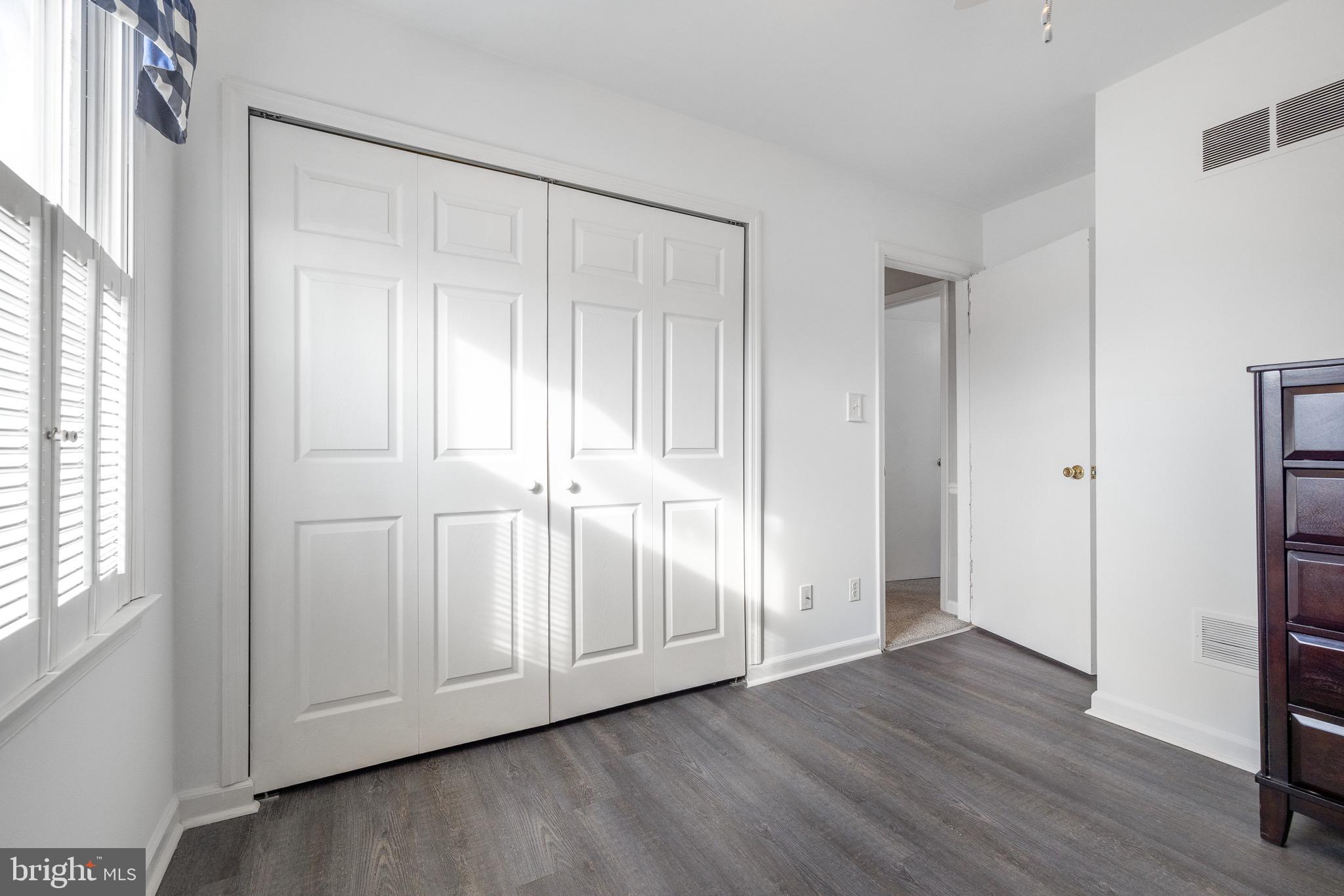 303 Gray Mt Circle Elkton, MD 21921 - Photo 24 of 35 a view of an empty room with wooden floor