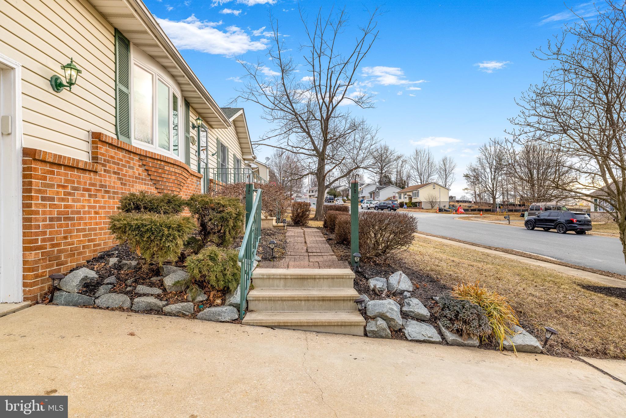 303 Gray Mt Circle Elkton, MD 21921 - Photo 6 of 35 a view of a pathway with a building in the background