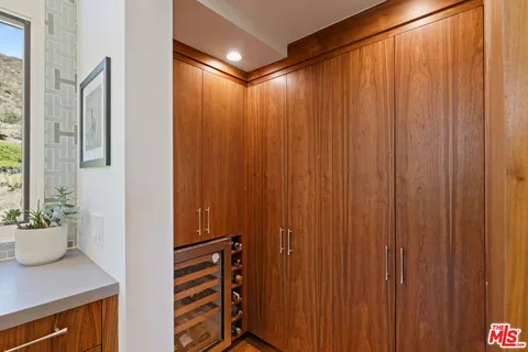 a living room with furniture fireplace and flat screen tv