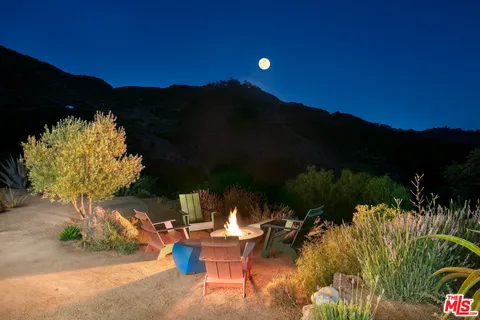 a view of a lake with a mountain in the background