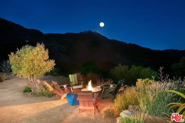 a view of a lake with a mountain in the background