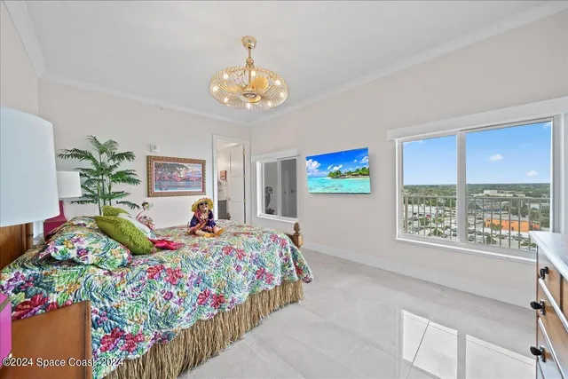 a living room with lots of furniture and a dining table