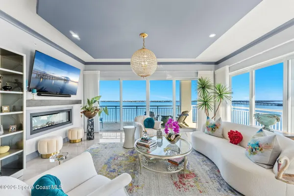 a view of a room with a large window