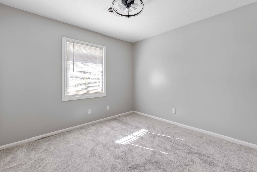 4601 Ritch Haven Road Columbus, GA 31909 - Photo 13 of 24 a view of room with window and wooden floor