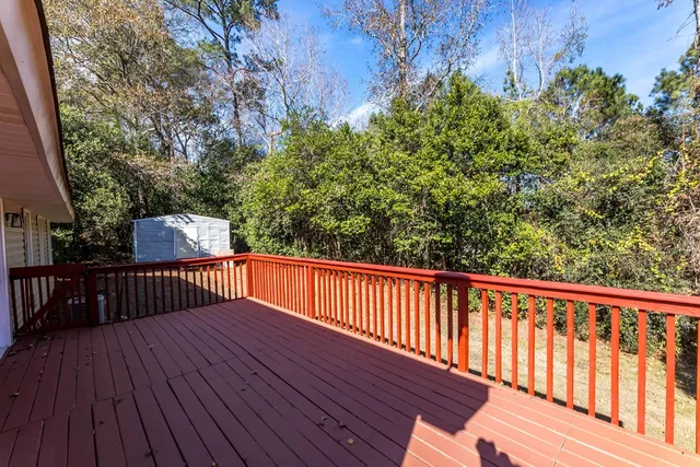 a view of balcony with wooden floor and outdoor space