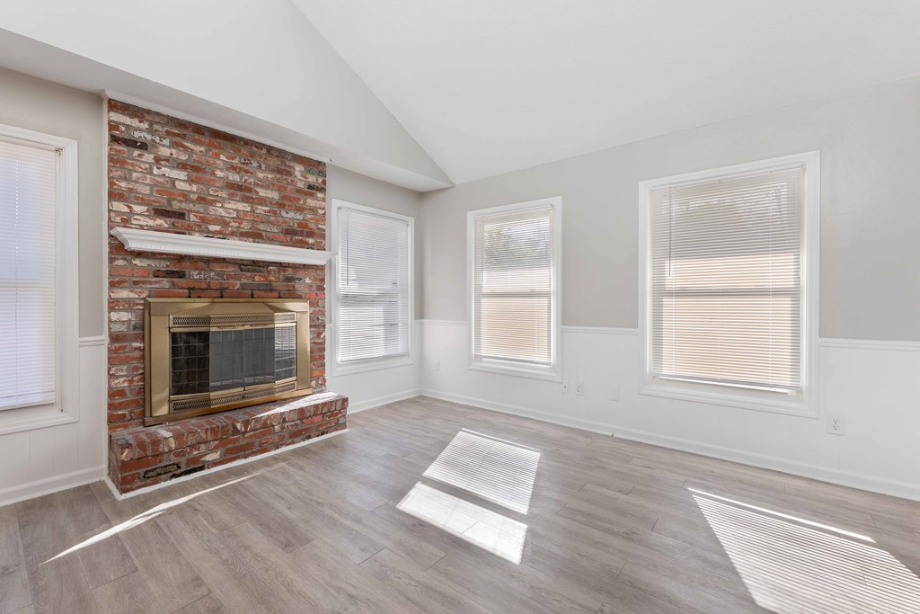 4601 Ritch Haven Road Columbus, GA 31909 - Photo 4 of 24 wooden floor fireplace and windows in an empty room