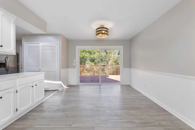 a view of an empty room and window