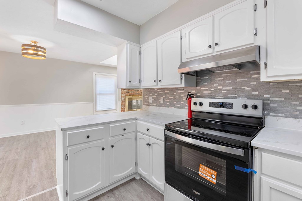 4601 Ritch Haven Road Columbus, GA 31909 - Photo 8 of 24 a kitchen with cabinets and appliances