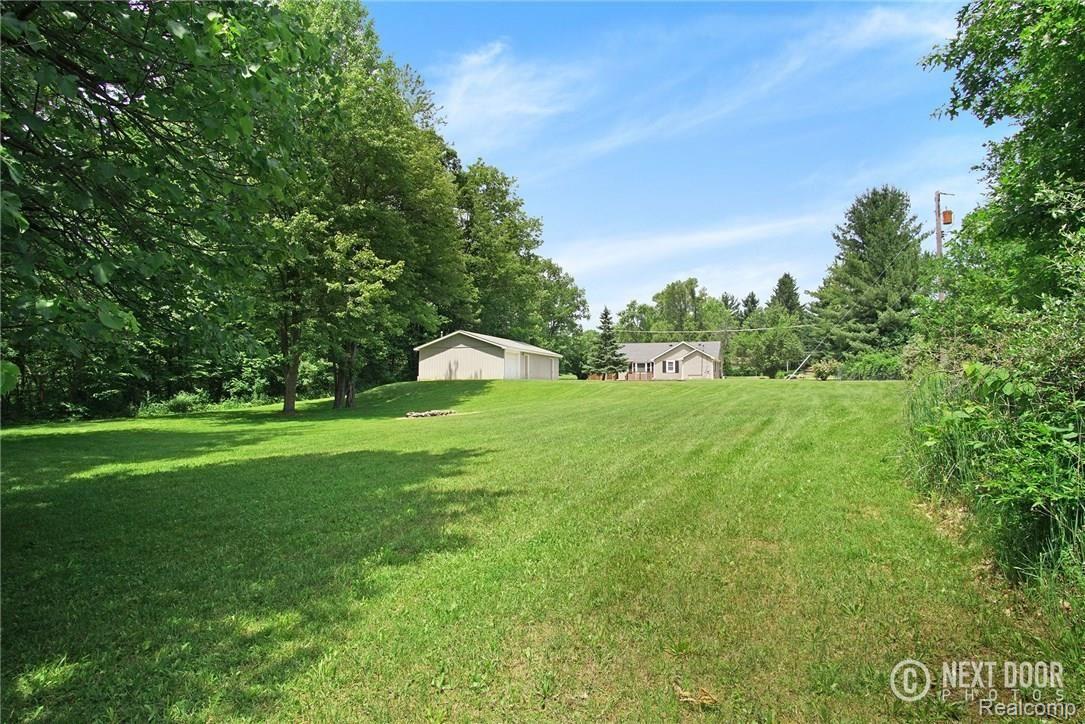 5789 Clarkston Road Clarkston, MI 48348 - Photo 7 of 37 VIEW FROM THE BACK YARD.jpg