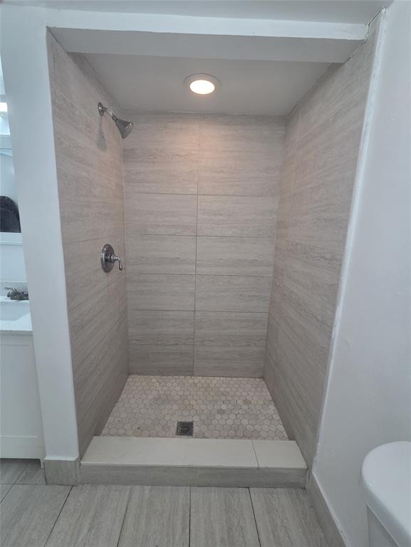 7901 South Colony Circle, Unit 101 Tamarac, FL 33321 - Photo 23 of 28 a bathroom with a shower