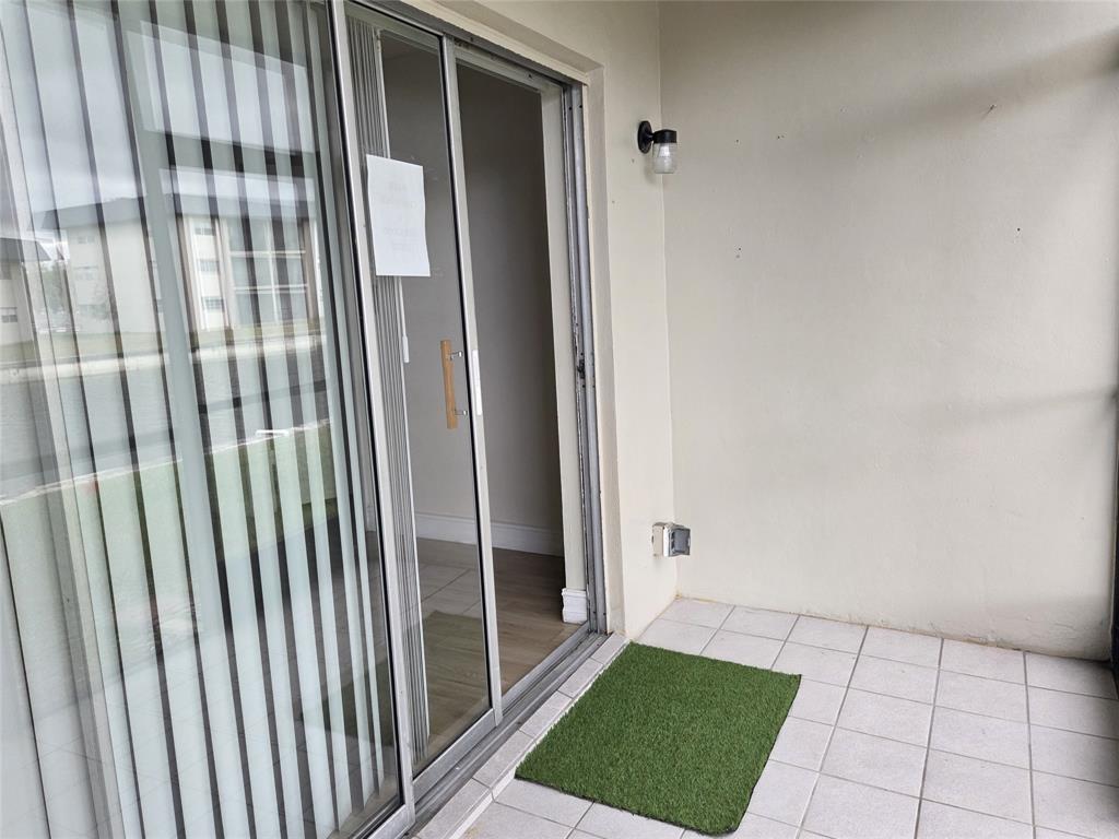 7901 South Colony Circle, Unit 101 Tamarac, FL 33321 - Photo 25 of 28 a view of a porch