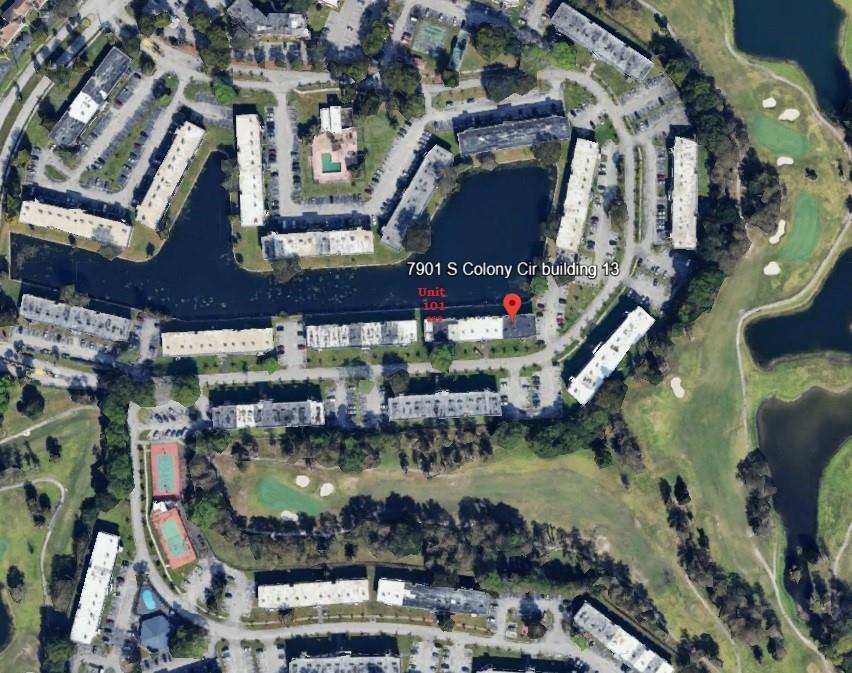 7901 South Colony Circle, Unit 101 Tamarac, FL 33321 - Photo 27 of 28 a city view with water heater and car parked