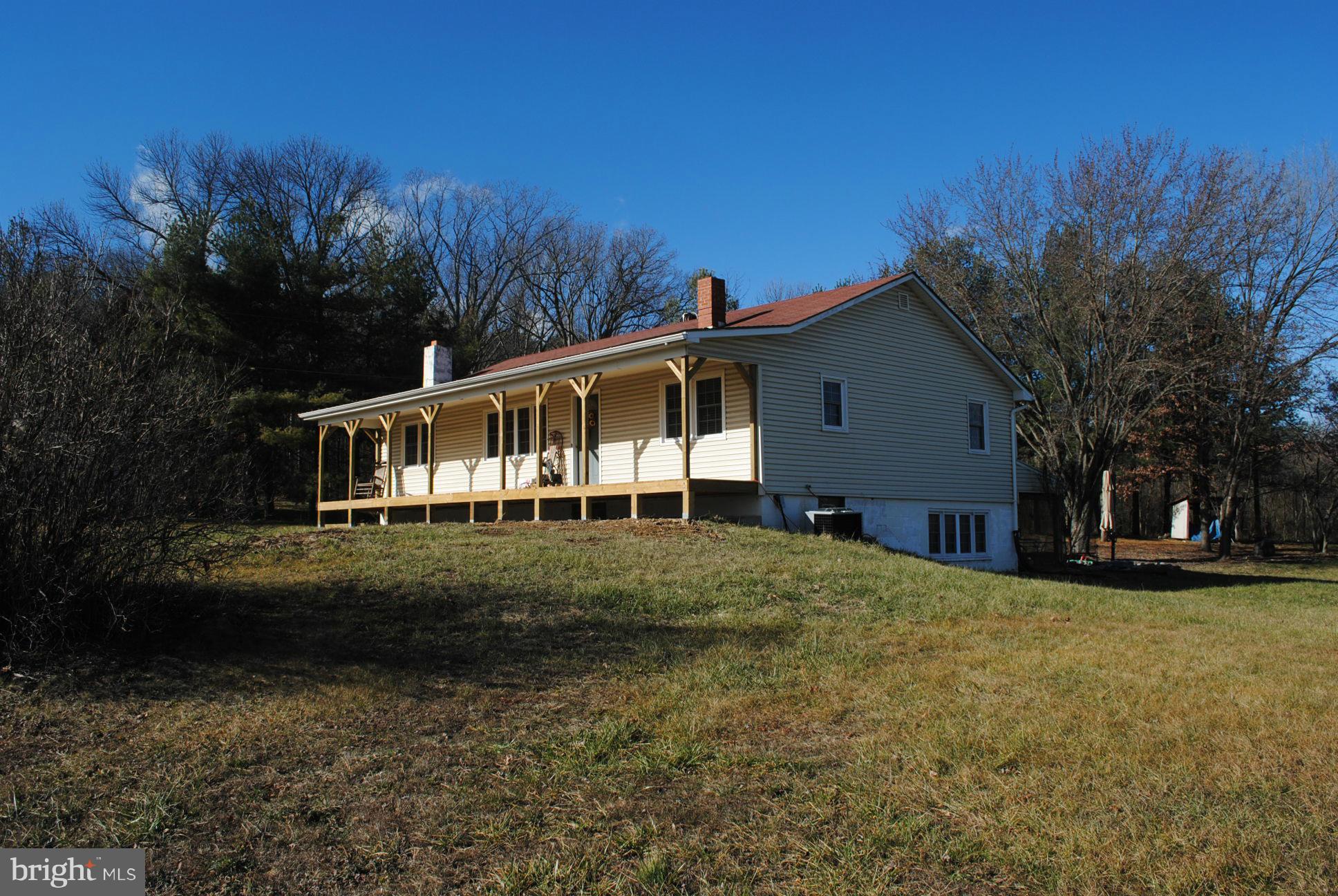 26 Messick Road Strasburg, VA 22657 - Photo 3 of 28 a view of a house with a yard