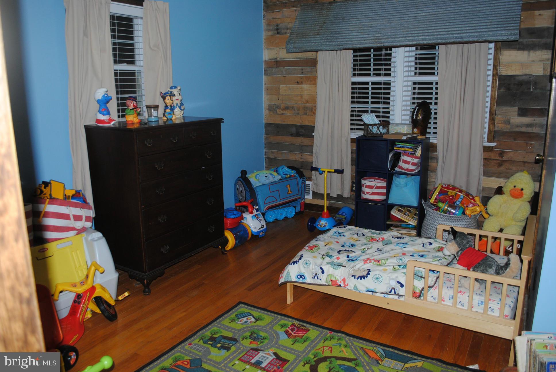 26 Messick Road Strasburg, VA 22657 - Photo 9 of 28 a bed room with bed and a window