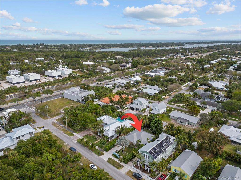 9182 Southeast Apollo Street Hobe Sound, FL 33455 - Photo 26 of 26 an aerial view of residential houses with outdoor space