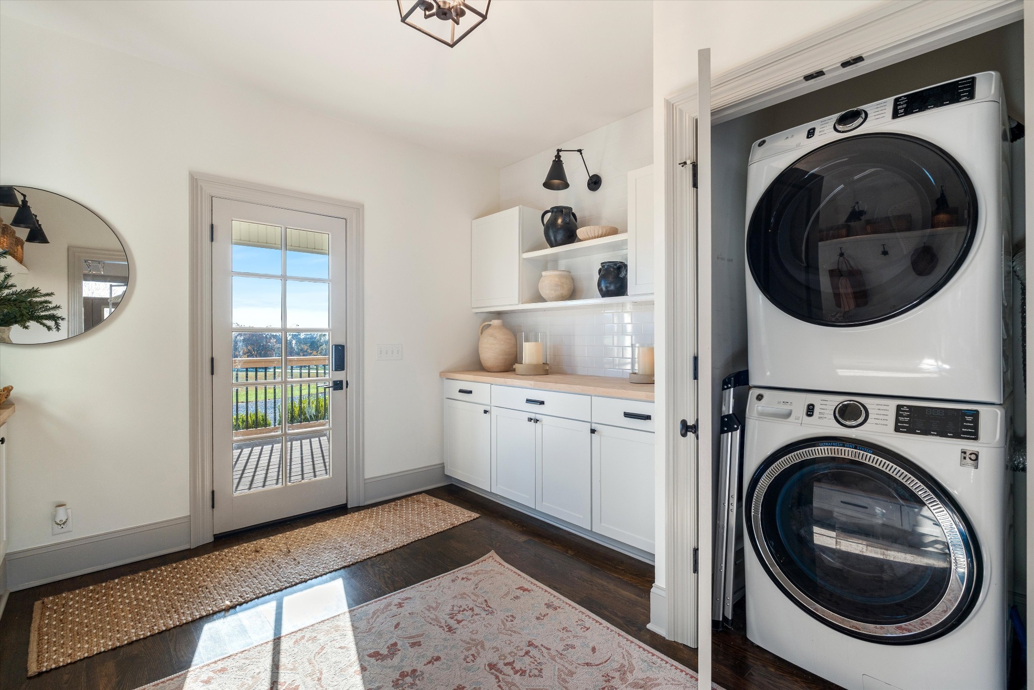 7314 Dug Hill Road Bon Aqua, TN 37025 - Photo 17 of 79 a view of a bedroom with washer and dryer