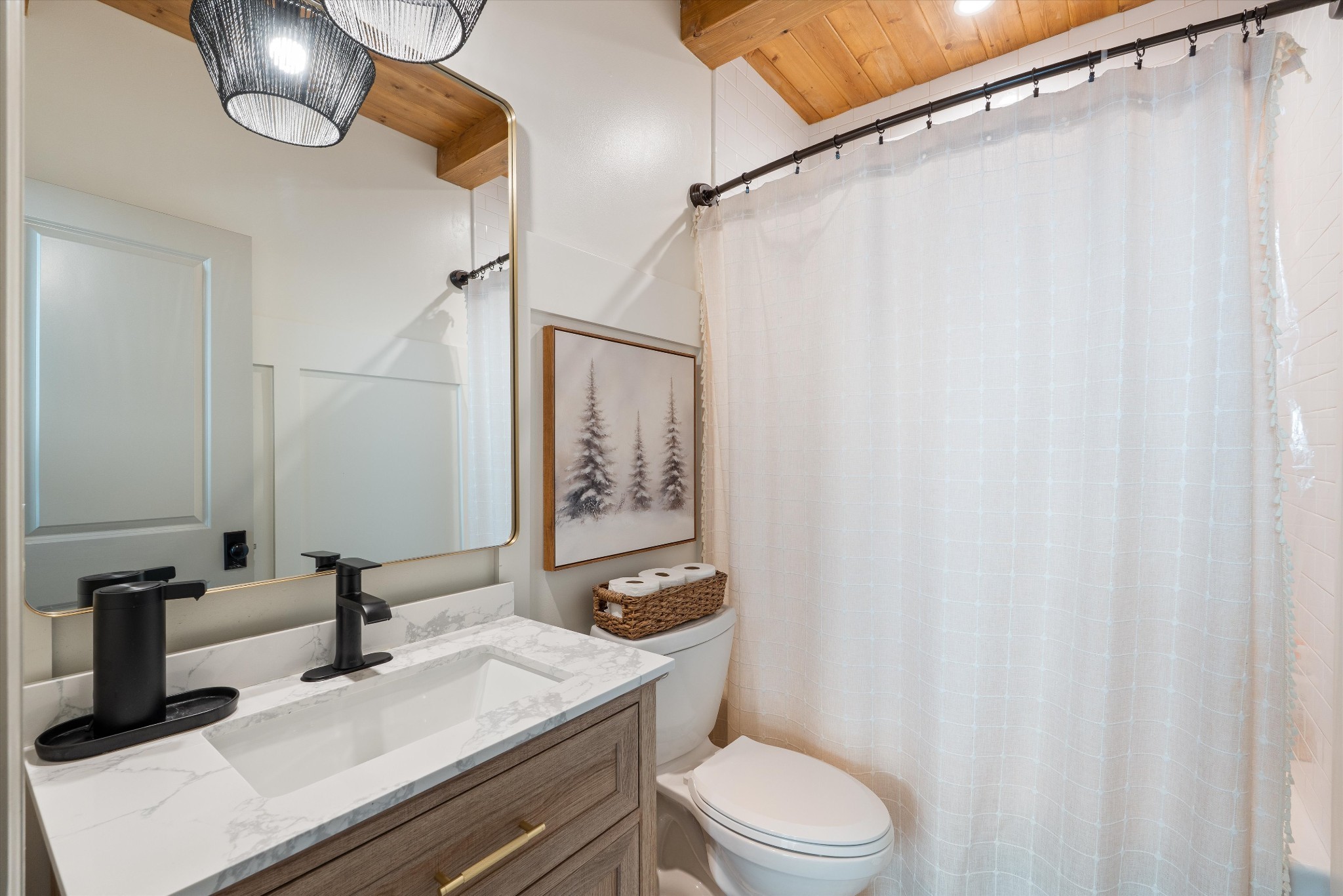 7314 Dug Hill Road Bon Aqua, TN 37025 - Photo 24 of 79 a bathroom with a sink a toilet a mirror and shower curtain