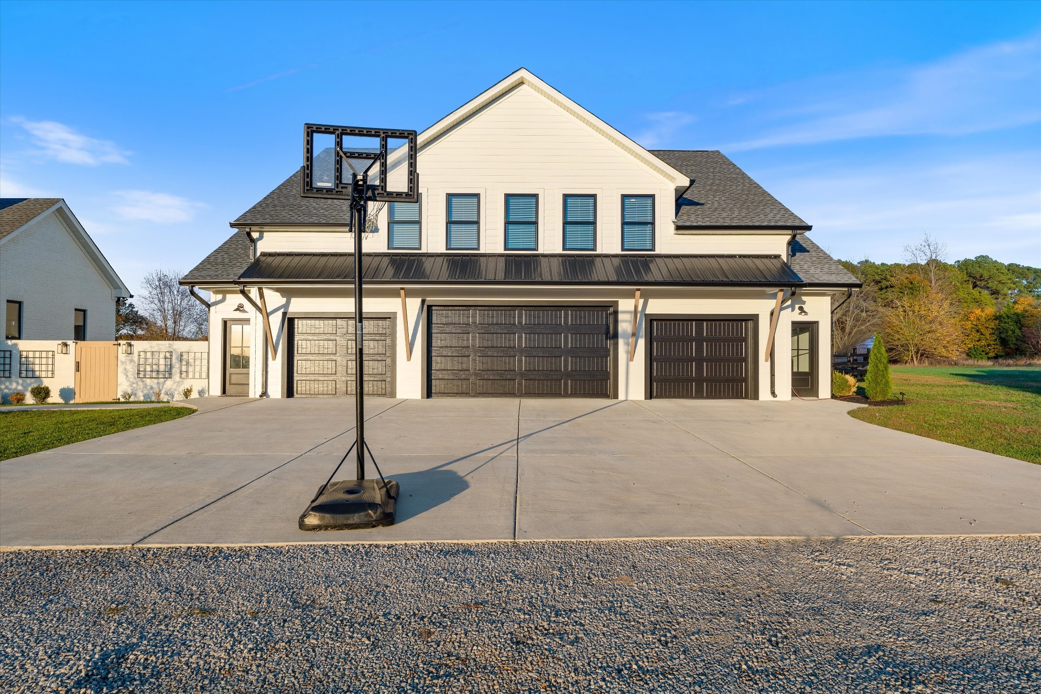7314 Dug Hill Road Bon Aqua, TN 37025 - Photo 55 of 79 a front view of a house with a yard and garage