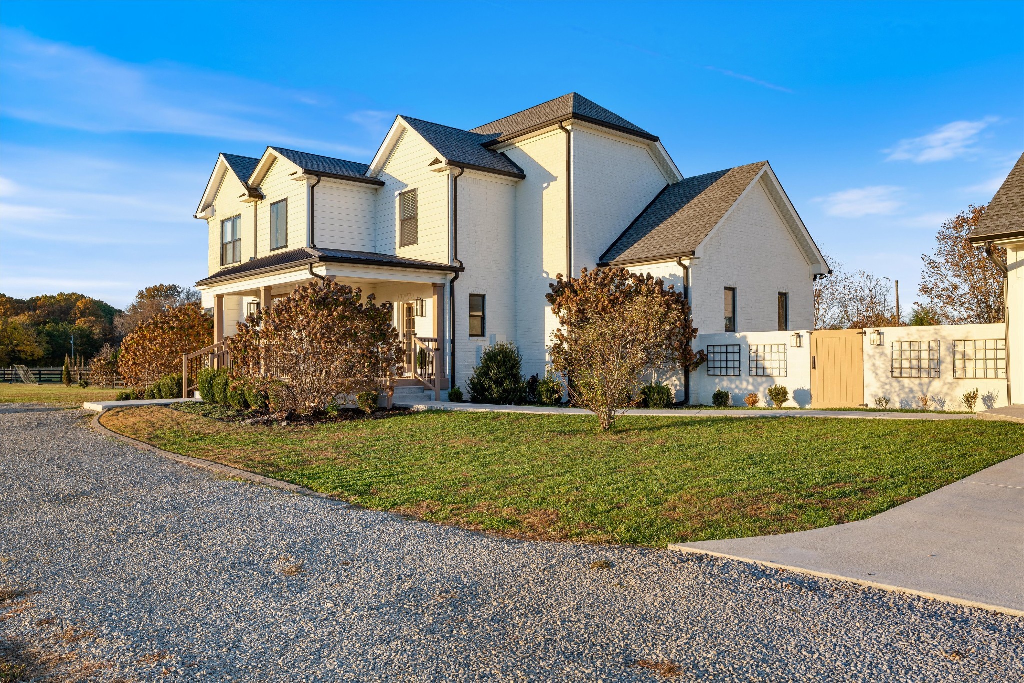 7314 Dug Hill Road Bon Aqua, TN 37025 - Photo 57 of 79 a front view of a house with a yard and garage