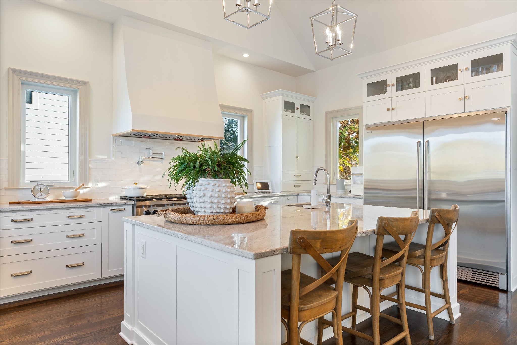 7314 Dug Hill Road Bon Aqua, TN 37025 - Photo 9 of 79 a kitchen with stainless steel appliances kitchen island granite countertop a table chairs and a refrigerator