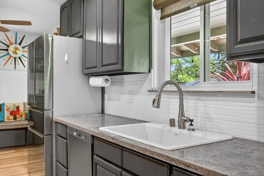4831 Jan Drive Carmichael, CA 95608 - Photo 12 of 69 a kitchen with stainless steel appliances granite countertop a sink and a refrigerator