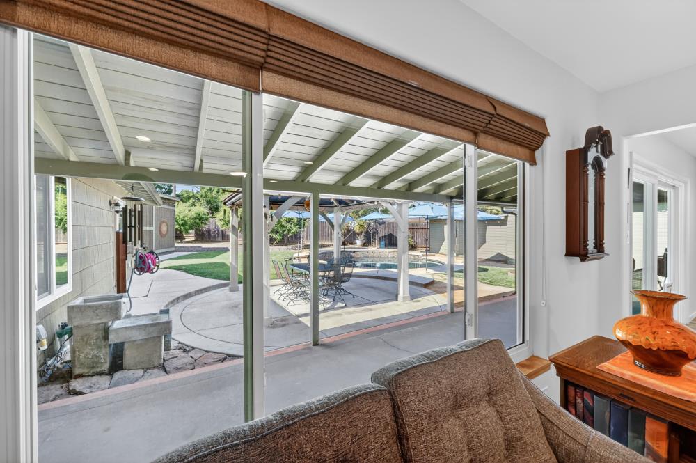 4831 Jan Drive Carmichael, CA 95608 - Photo 21 of 69 a bedroom with furniture and large windows