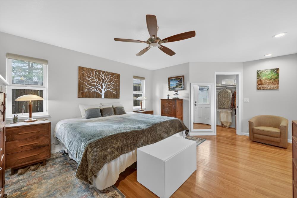 4831 Jan Drive Carmichael, CA 95608 - Photo 24 of 69 a spacious bedroom with a bed a couch and a window