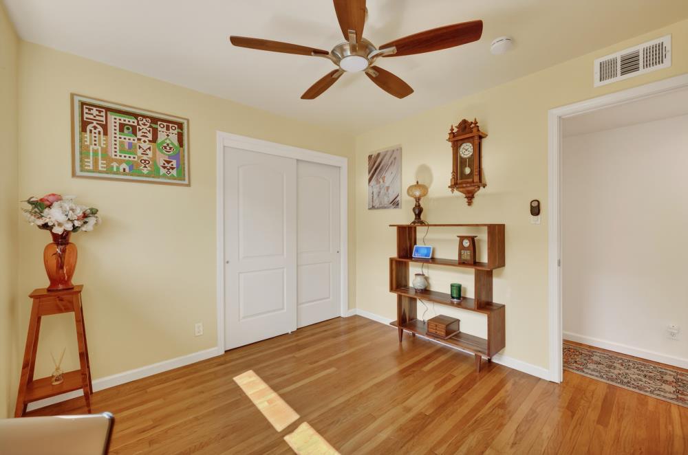 4831 Jan Drive Carmichael, CA 95608 - Photo 35 of 69 a bedroom with a bed and a table