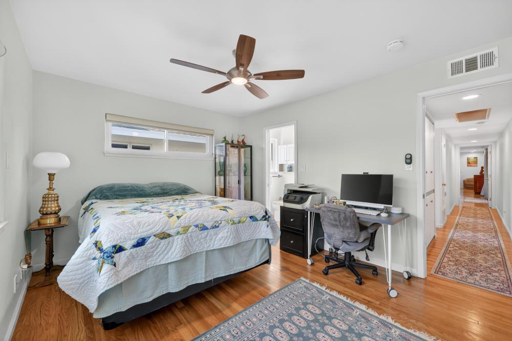 4831 Jan Drive Carmichael, CA 95608 - Photo 39 of 69 a bedroom with a bed and a desk