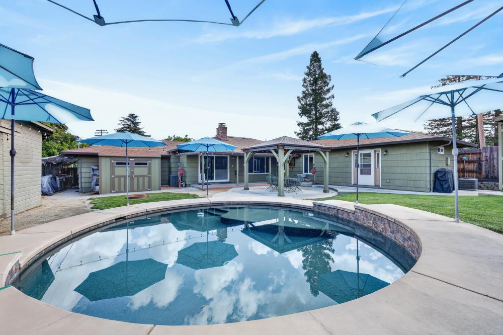 4831 Jan Drive Carmichael, CA 95608 - Photo 44 of 69 a view of a house with swimming pool and a yard