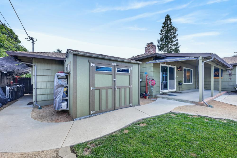 4831 Jan Drive Carmichael, CA 95608 - Photo 50 of 69 a view of a house with a patio and a yard