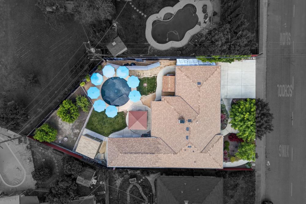 4831 Jan Drive Carmichael, CA 95608 - Photo 56 of 69 an aerial view of a backyard with chairs and a fire pit