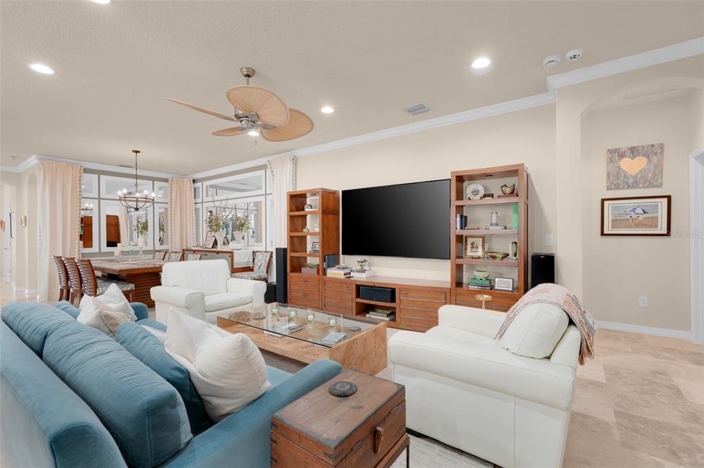 1038 Timbervale Trail Clermont, FL 34715 - Photo 18 of 54 a living room with furniture and a flat screen tv