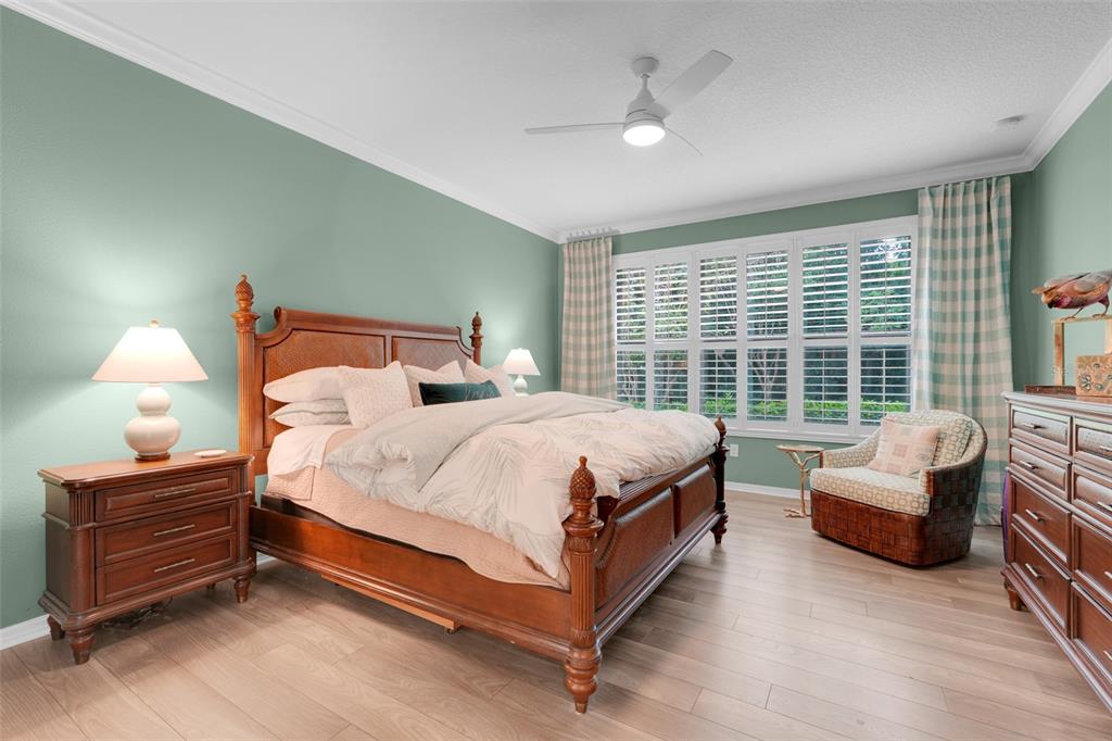 1038 Timbervale Trail Clermont, FL 34715 - Photo 25 of 54 a bed room with a bed and a couch