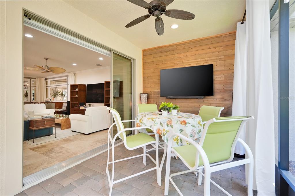 1038 Timbervale Trail Clermont, FL 34715 - Photo 35 of 54 a living room with furniture and a flat screen tv