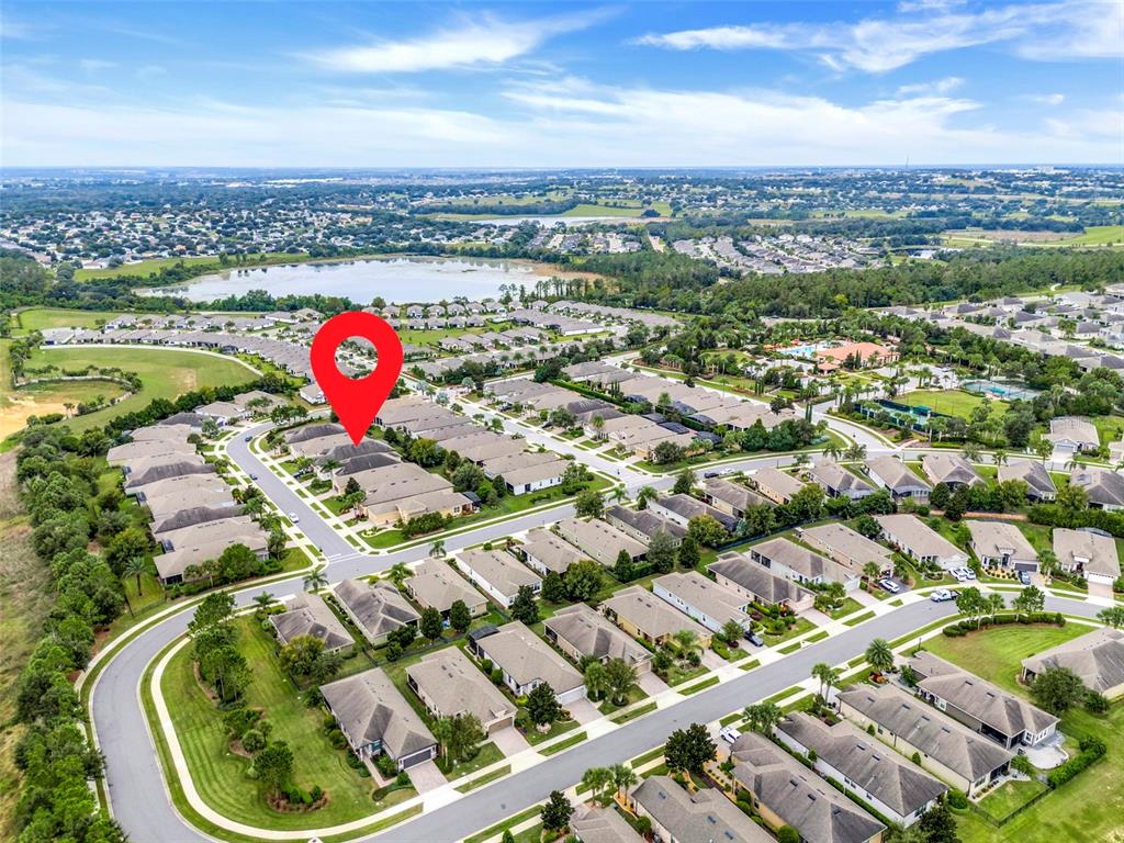 1038 Timbervale Trail Clermont, FL 34715 - Photo 44 of 54 an aerial view of a swimming pool and mountain view