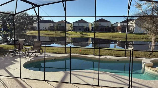 a bedroom with two beds and a window