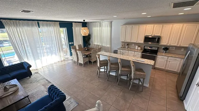 a view of a workspace with furniture